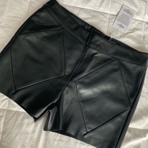 Black faux leather shorts